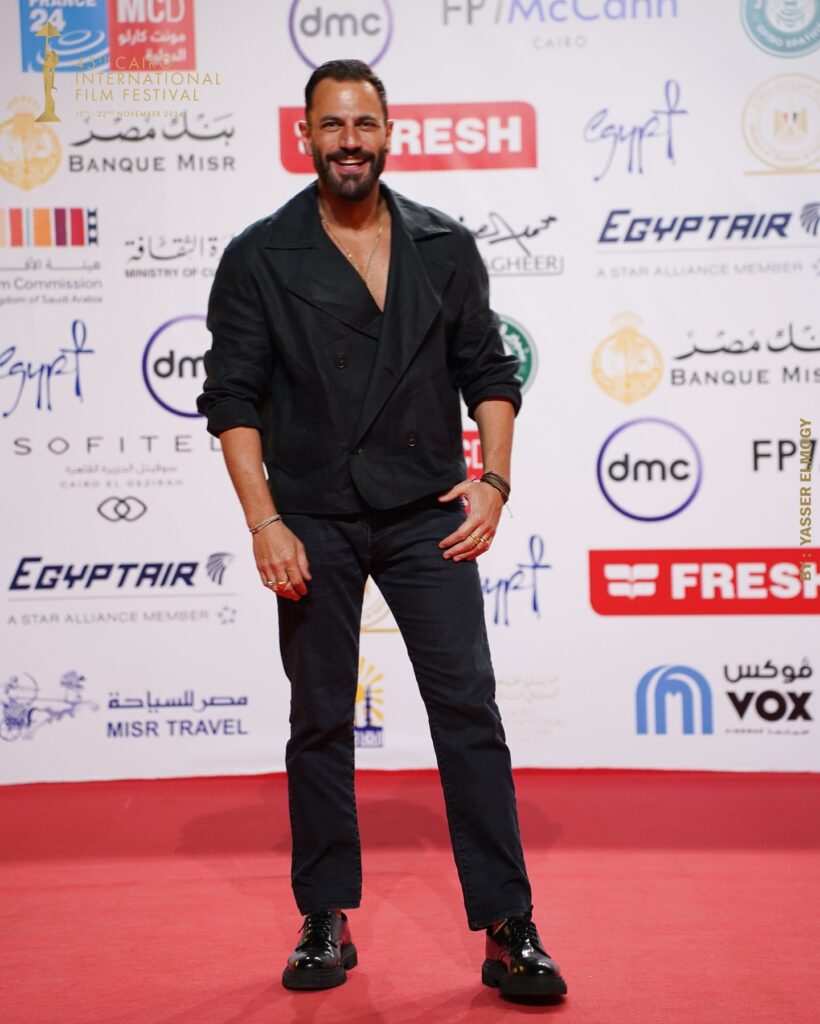 اطلالات ابطال فيلم في الكاميرا على السجادة الحمراء لمهرجان القاهرة السينمائي 8 اطلالة-نيقولا-معوض